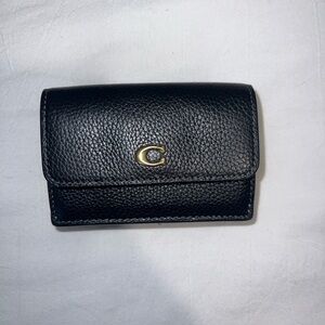 coach black trifold wallet with gold hardware